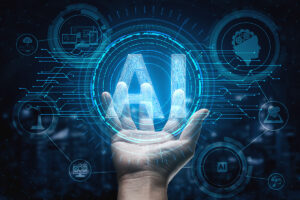 A hand is reaching out and holding a graphic with the letters "AI" and circuit board designs.